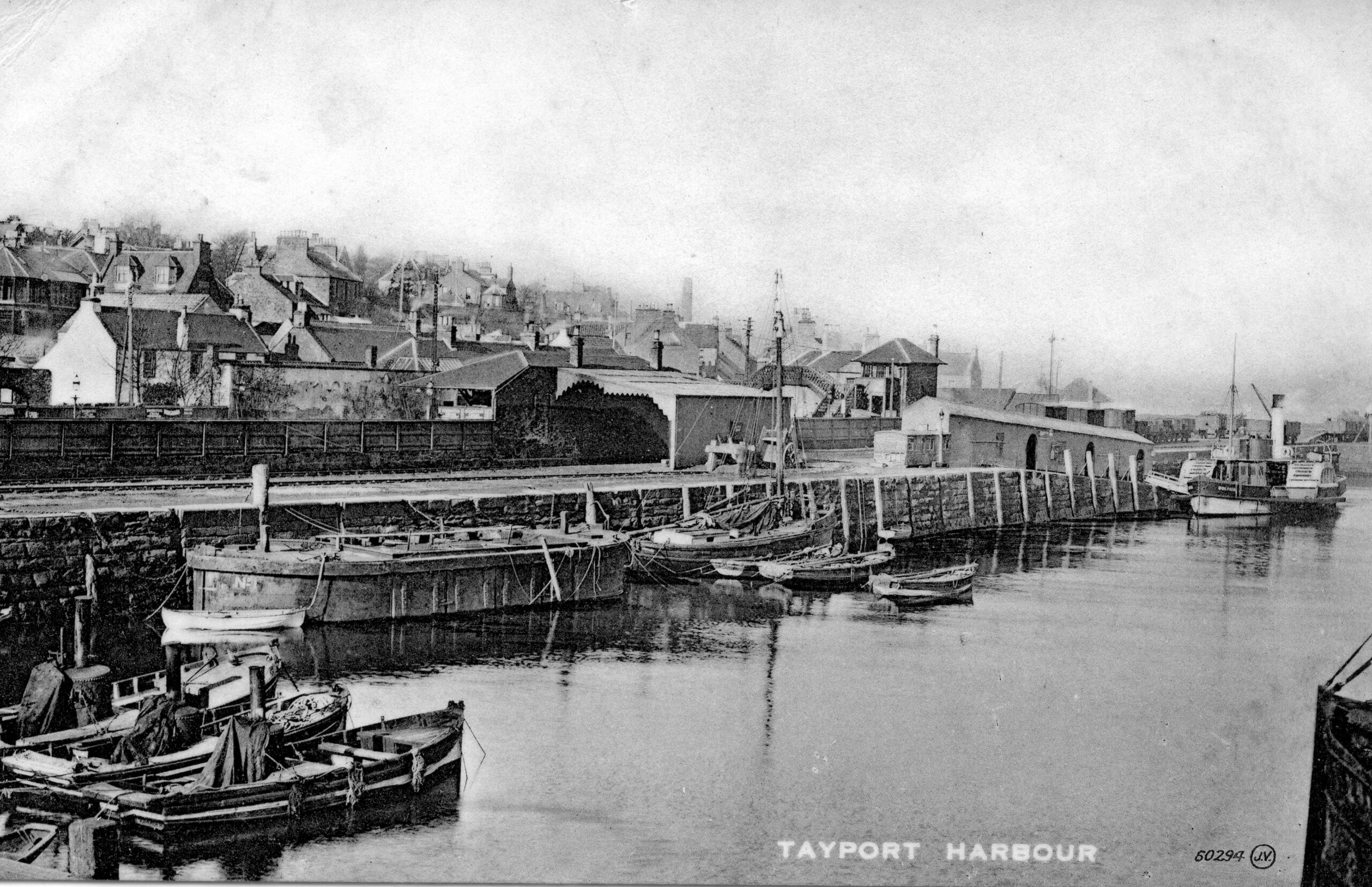 Tayport Heritage Trail - Board 21 - Mussel boat moorings and passenger ferry Dolphin with railway station on left