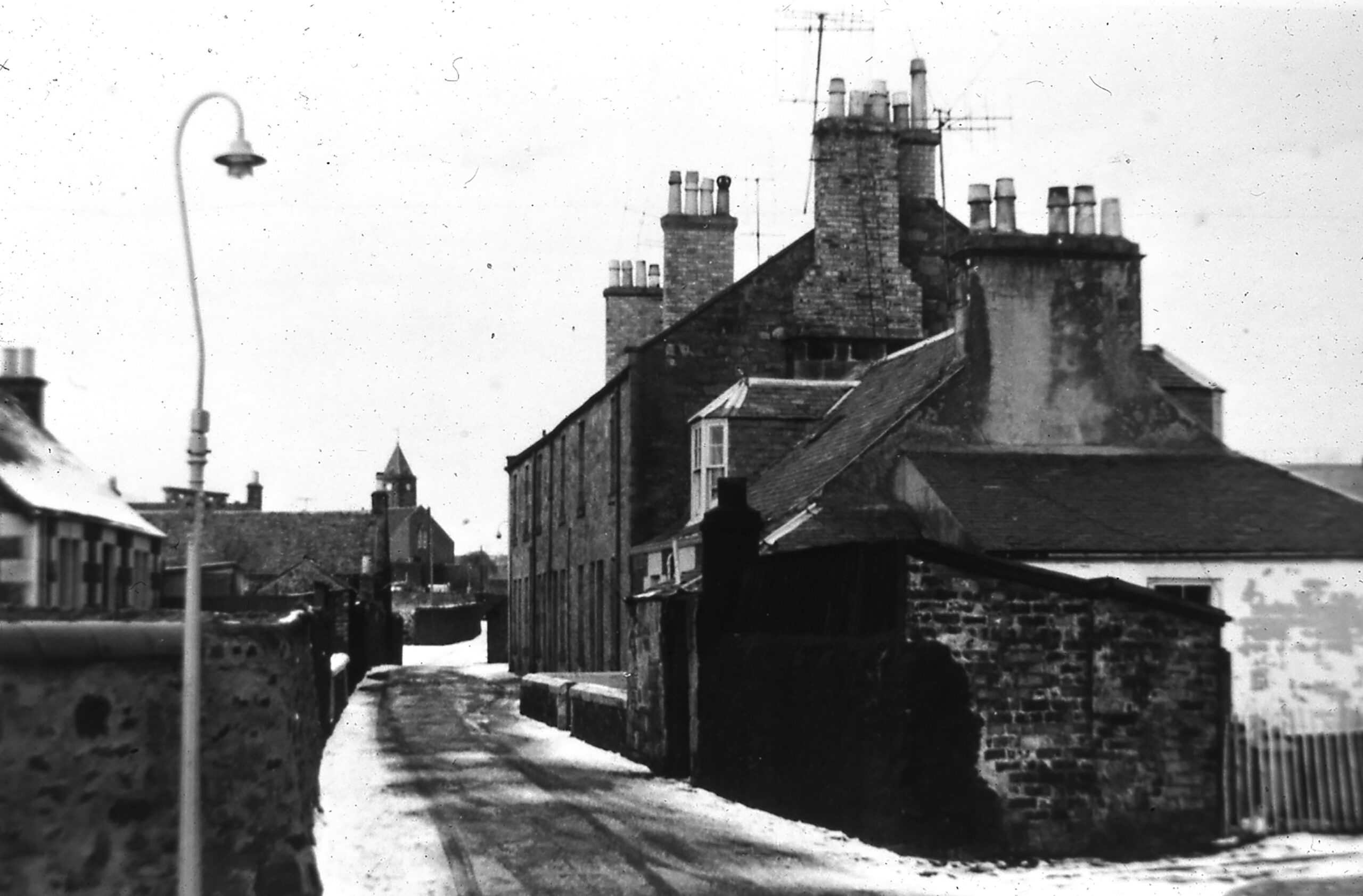 Tayport Heritage Trail - Board 22 - Cowgate from junction with Nelson Lane looking towards Henderson St. & Greenside Place