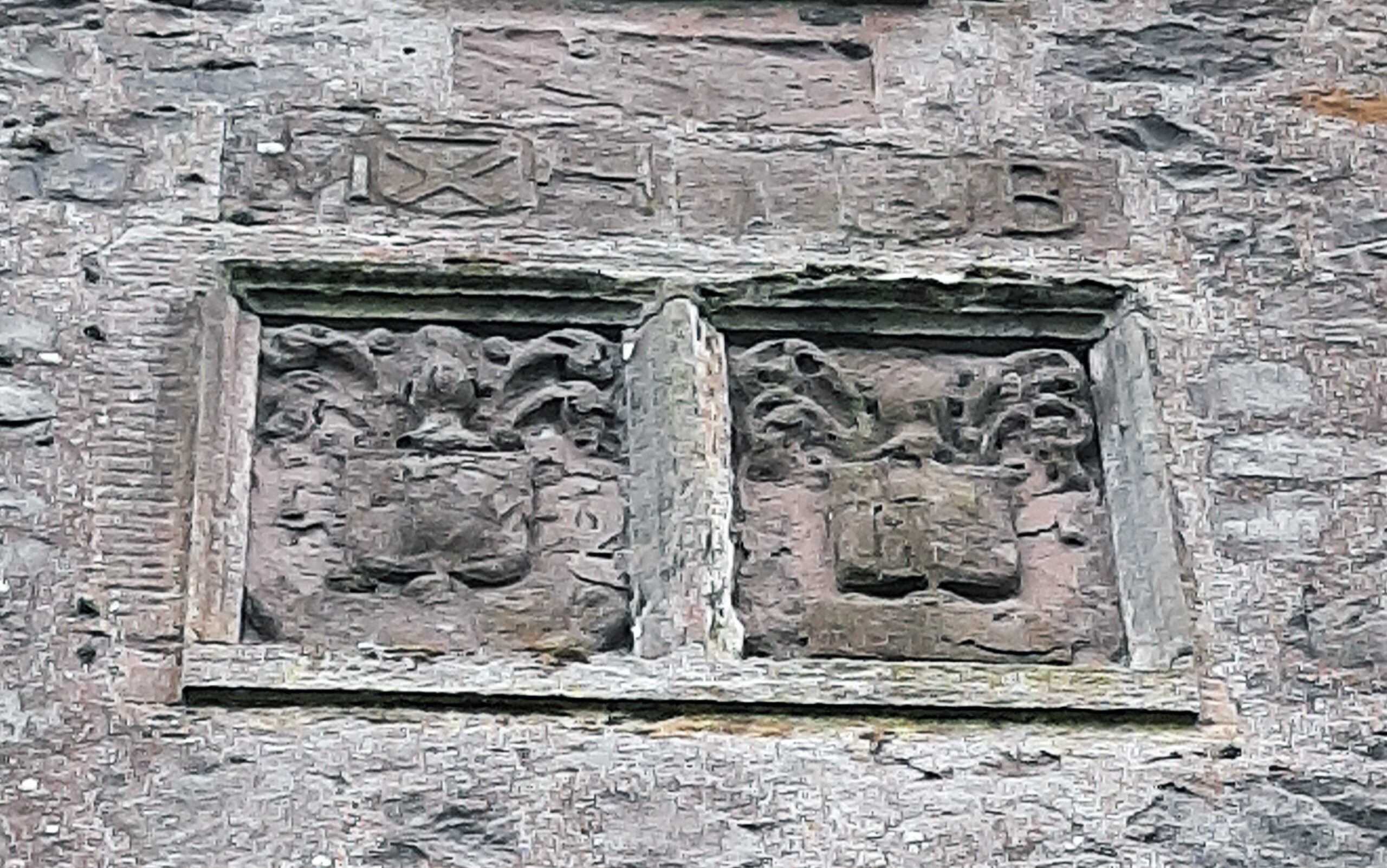 Tayport Heritage Trail - Board 23 - Margaret Hartsyde & Sir John Buchanan- Coats of Arms on steeple and also of their son-in-law Sir Arthur Erskine and his wife Margaret Buchanan (circa 1646)
